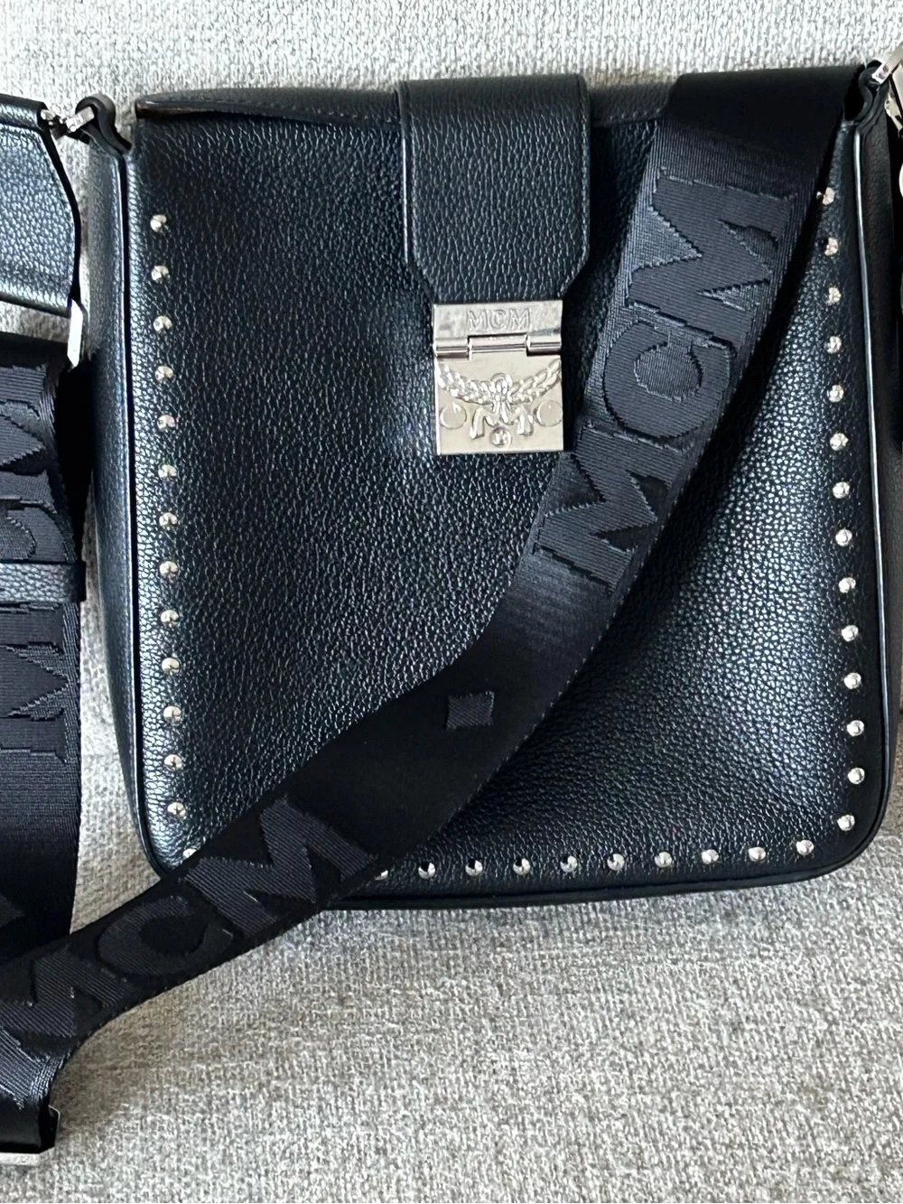 Authentic MCM Black Leather Messenger Bag with Logo Webbing Strap